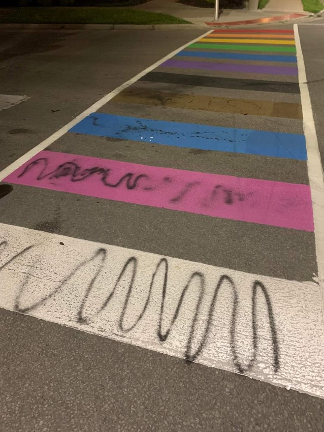 vandalized rainbow crosswalk